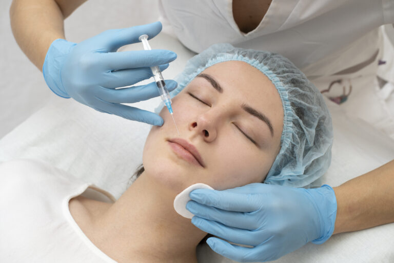 close up woman lip filler procedure