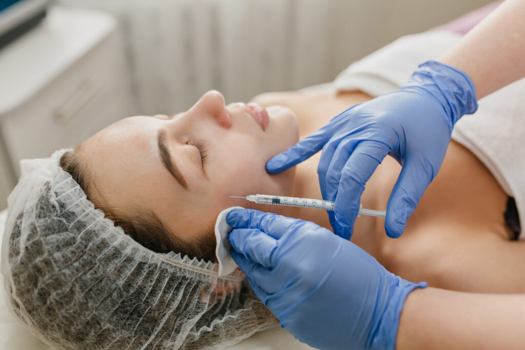 Skincare, cosmetology procedure of pretty woman in hospital. Rejuvenation, injecting, professional therapy, healthcare, plastic, botox, beauty.